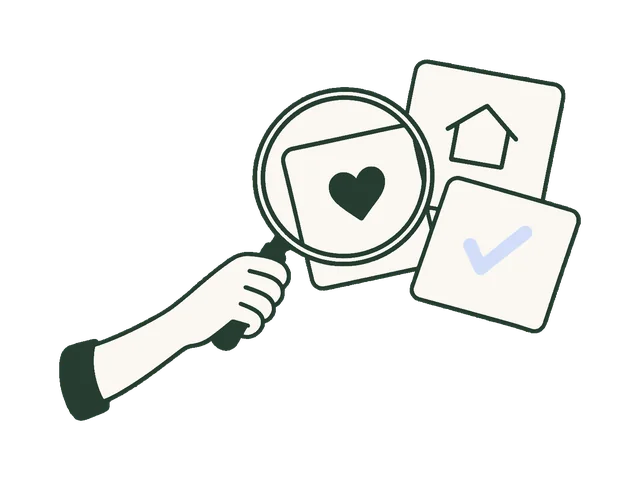 A helping hand holding a magnifying glass over benefit cards.